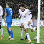 Maghnes Akliouche bernomor punggung 12 merayakan gol perdananya untuk Prancis melawan Azerbaijan